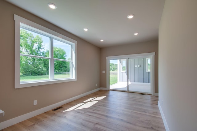 1151 Canaan Rd, Columbia, TN 38401 - empty room with baseboards, light wood-style flooring, and recessed lighting