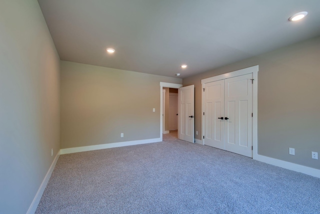 1151 Canaan Rd, Columbia, TN 38401 - unfurnished bedroom with light carpet, baseboards, and recessed lighting