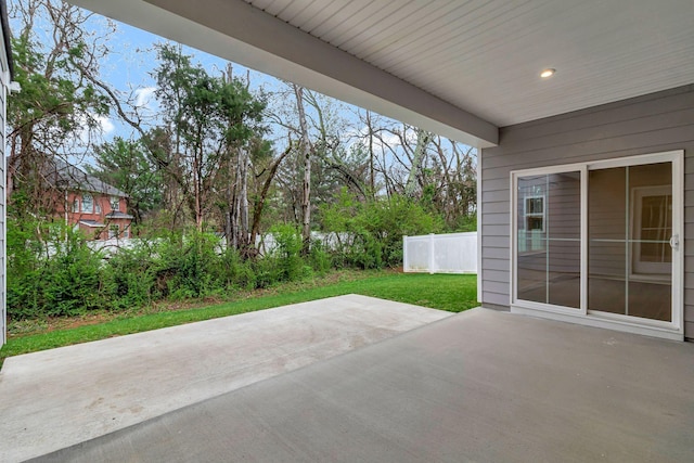 view of patio / terrace featuring fence