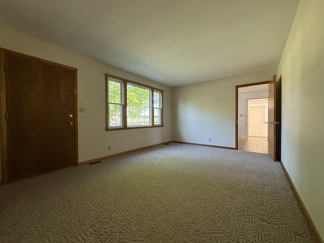 106 W Park Dr, Clarksville, TN 37043 - unfurnished room with baseboards, light carpet, and visible vents