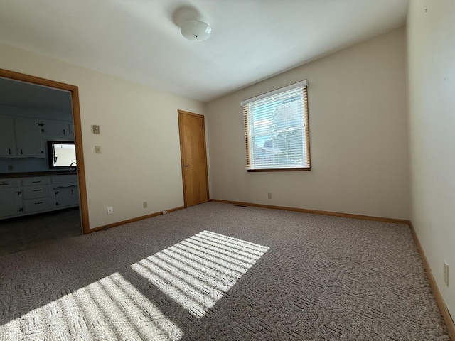 106 W Park Dr, Clarksville, TN 37043 - unfurnished bedroom with baseboards and carpet