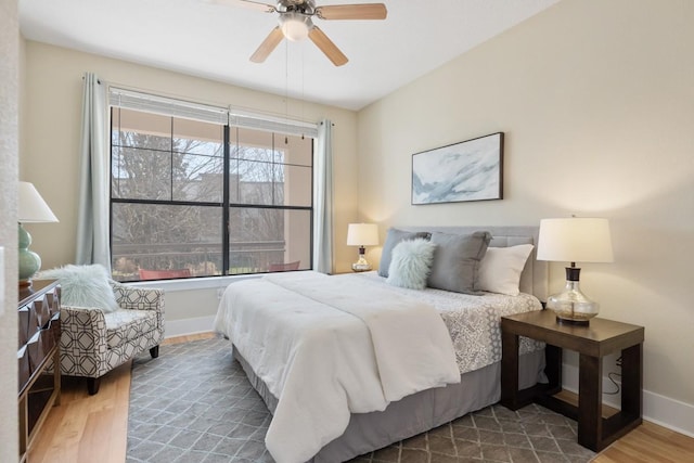 2600 Hillsboro Pike Unit 204, Nashville, TN 37212 - bedroom with baseboards, ceiling fan, and wood finished floors