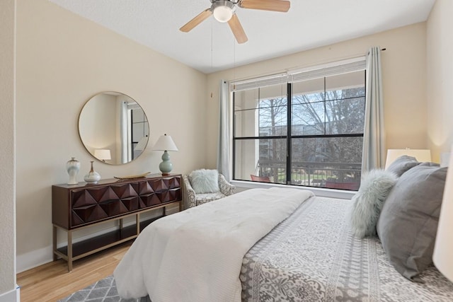 2600 Hillsboro Pike Unit 204, Nashville, TN 37212 - bedroom with baseboards, wood finished floors, and ceiling fan