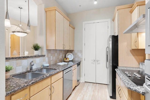 2600 Hillsboro Pike Unit 204, Nashville, TN 37212 - kitchen with light brown cabinets, dark stone counters, a sink, and stainless steel appliances
