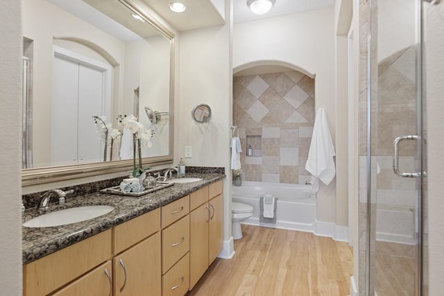 2600 Hillsboro Pike Unit 204, Nashville, TN 37212 - bathroom with toilet, a sink, an enclosed shower, and wood finished floors
