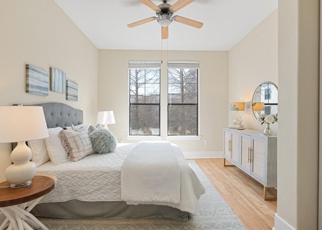 2600 Hillsboro Pike Unit 204, Nashville, TN 37212 - bedroom featuring baseboards, ceiling fan, and light wood-style flooring