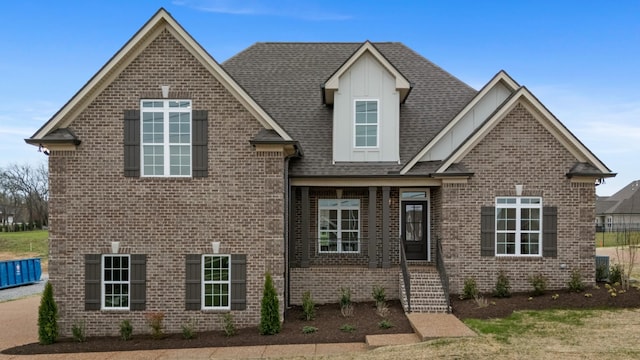 1121 Joe Martin Ln, Lebanon, TN 37087 - view of front facade featuring board and batten siding, brick siding, and roof with shingles