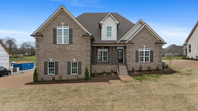 1121 Joe Martin Ln, Lebanon, TN 37087 - view of front of property with a shingled roof, a front yard, and brick siding