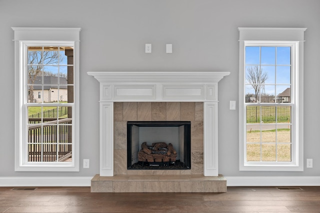 1121 Joe Martin Ln, Lebanon, TN 37087 - details with a high end fireplace, wood finished floors, and visible vents