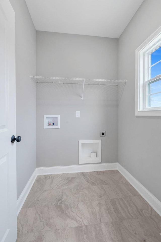 1121 Joe Martin Ln, Lebanon, TN 37087 - laundry area featuring baseboards, laundry area, hookup for an electric dryer, and hookup for a washing machine