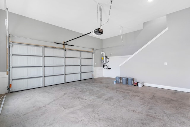 1121 Joe Martin Ln, Lebanon, TN 37087 - garage featuring baseboards and a garage door opener