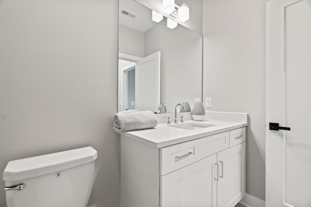 205 Charlotte Everly Cir, Hendersonville, TN 37075 - half bathroom featuring baseboards, visible vents, toilet, and vanity