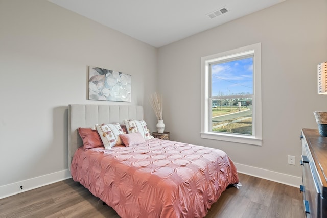 205 Charlotte Everly Cir, Hendersonville, TN 37075 - bedroom featuring baseboards, visible vents, and wood finished floors