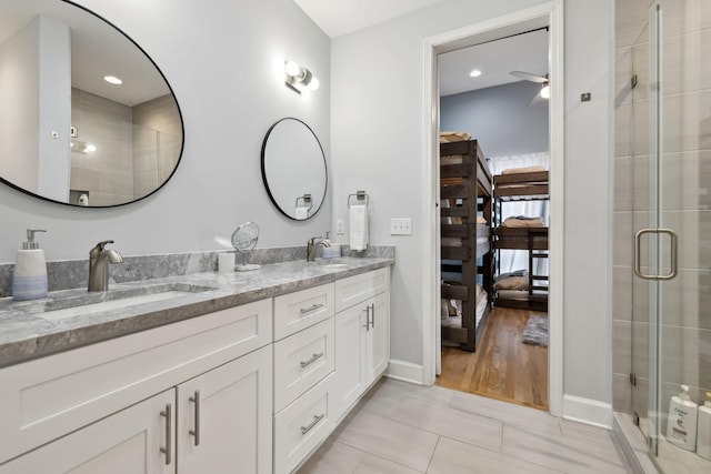 1930D Herman St, Nashville, TN 37208 - full bathroom featuring double vanity, connected bathroom, a sink, and a stall shower