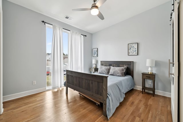 1930D Herman St, Nashville, TN 37208 - bedroom featuring baseboards, visible vents, ceiling fan, and light wood-type flooring