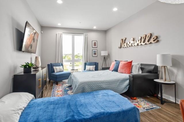 5403 Centennial Blvd Unit 203, Nashville, TN 37209 - bedroom with baseboards, wood finished floors, and recessed lighting