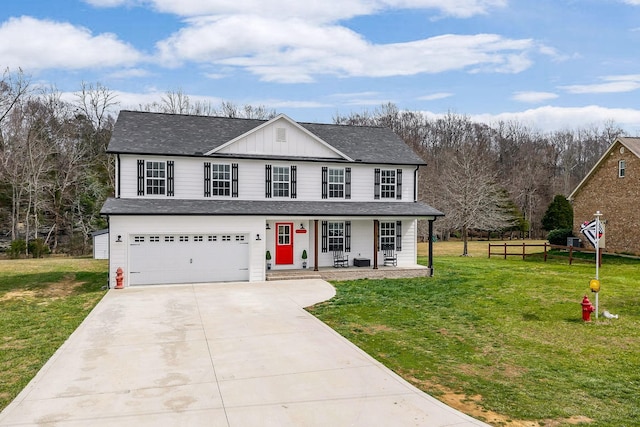 view of front of home with covered porch, an attached garage, a front lawn, driveway, and a shingled roof