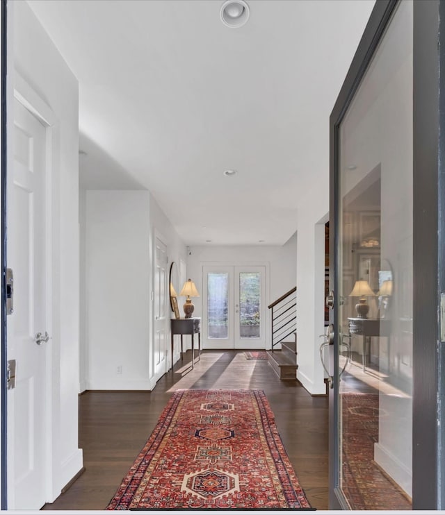915 Overton Lea Rd, Nashville, TN 37220 - foyer entrance with french doors, stairway, and wood finished floors