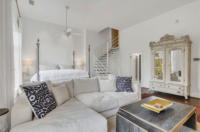 915 Overton Lea Rd, Nashville, TN 37220 - living room featuring stairway, dark wood-type flooring, and a ceiling fan