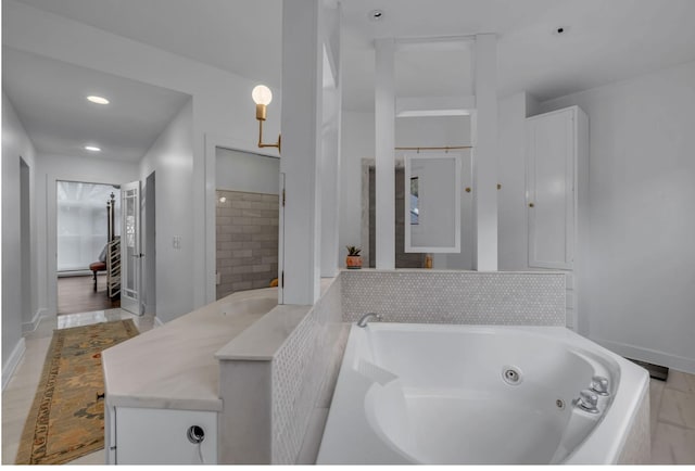 915 Overton Lea Rd, Nashville, TN 37220 - full bath with a jetted tub, vanity, and recessed lighting