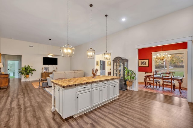 230 Anchor Dr, Waverly, TN 37185 - kitchen with a kitchen island, a chandelier, white cabinetry, wooden counters, and dark wood-type flooring