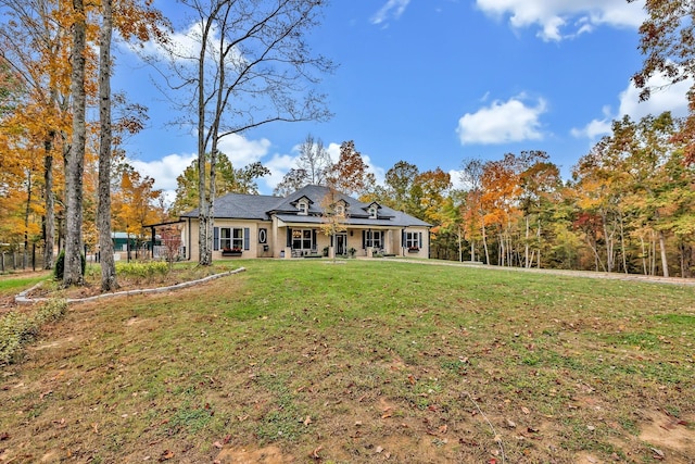 230 Anchor Dr, Waverly, TN 37185 - view of front of home with a front yard and roof mounted solar panels