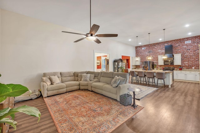 230 Anchor Dr, Waverly, TN 37185 - living room featuring visible vents, wood finished floors, recessed lighting, a ceiling fan, and brick wall