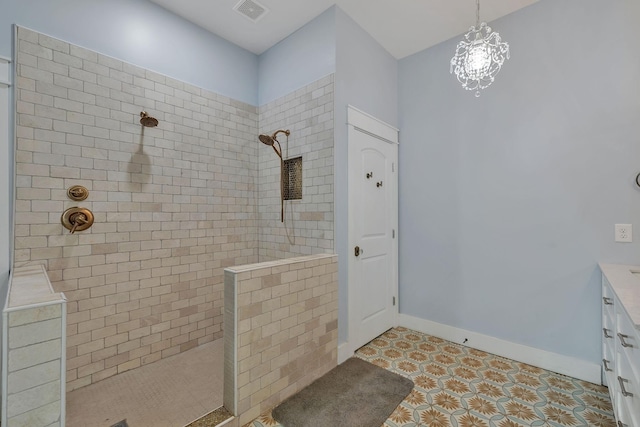 230 Anchor Dr, Waverly, TN 37185 - full bathroom featuring visible vents, walk in shower, baseboards, vanity, and a notable chandelier
