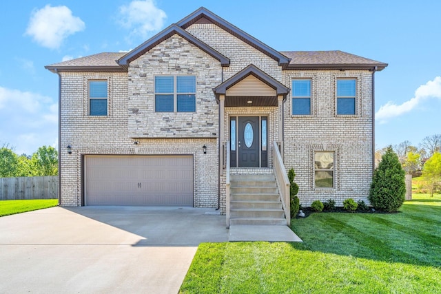 2263 Allen Griffey Ct, Clarksville, TN 37042 - view of front of home with driveway, brick siding, fence, an attached garage, and a front yard