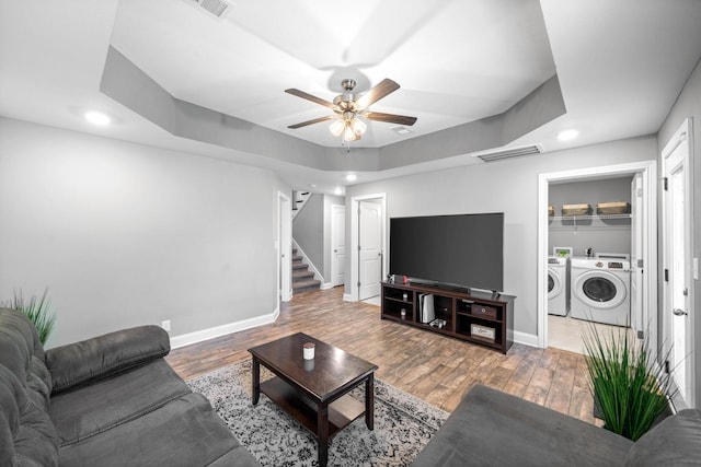 2263 Allen Griffey Ct, Clarksville, TN 37042 - living area featuring recessed lighting, ceiling fan, visible vents, washing machine and clothes dryer, and stairway