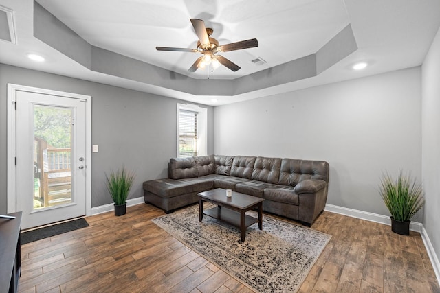 2263 Allen Griffey Ct, Clarksville, TN 37042 - living area featuring baseboards, ceiling fan, plenty of natural light, and hardwood / wood-style flooring