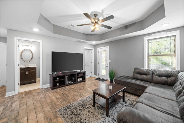 2263 Allen Griffey Ct, Clarksville, TN 37042 - living area featuring wood finished floors, visible vents, recessed lighting, a ceiling fan, and baseboards