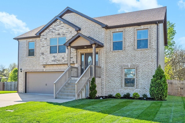 2263 Allen Griffey Ct, Clarksville, TN 37042 - bi-level home with brick siding, driveway, fence, and a front yard