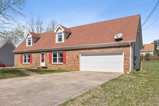 1571 Barrett Dr, Clarksville, TN 37043 - new england style home with brick siding, concrete driveway, a garage, and a front lawn