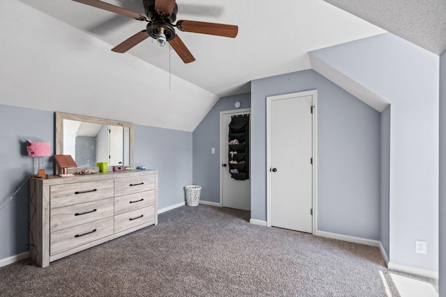 1571 Barrett Dr, Clarksville, TN 37043 - bonus room featuring baseboards, vaulted ceiling, dark carpet, and a ceiling fan