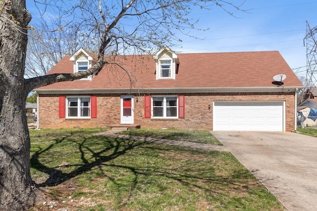 1571 Barrett Dr, Clarksville, TN 37043 - new england style home with brick siding, concrete driveway, a garage, and a front lawn