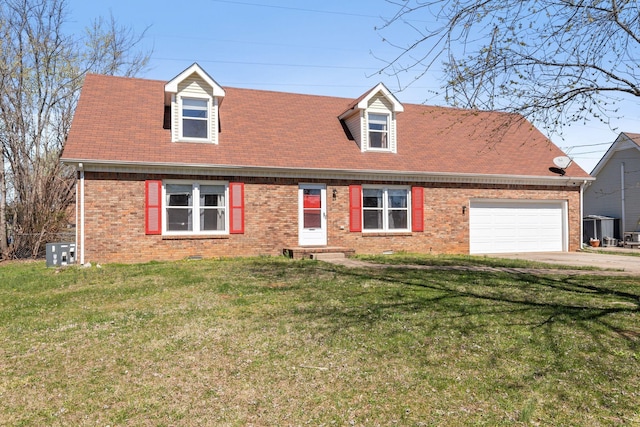 1571 Barrett Dr, Clarksville, TN 37043 - cape cod home featuring brick siding, driveway, a garage, and a front lawn