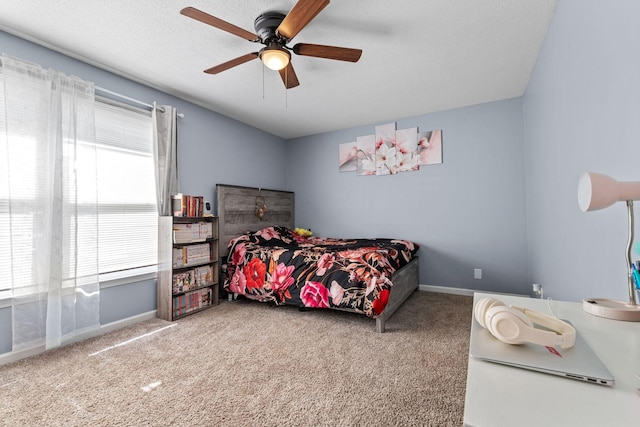 1571 Barrett Dr, Clarksville, TN 37043 - carpeted bedroom with a textured ceiling, baseboards, and ceiling fan