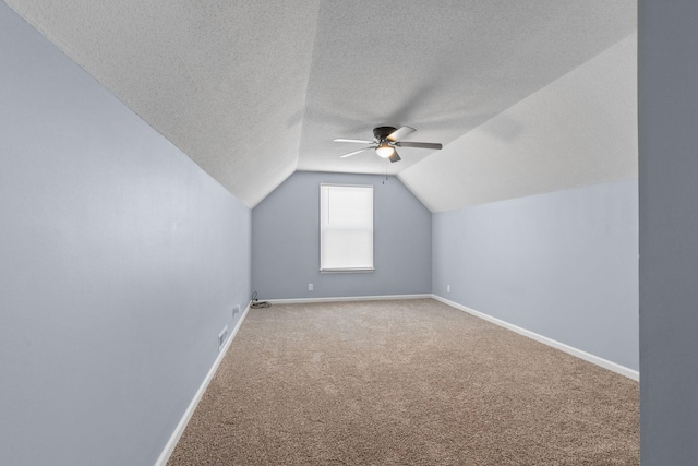 1571 Barrett Dr, Clarksville, TN 37043 - bonus room with a textured ceiling, carpet, baseboards, a ceiling fan, and lofted ceiling