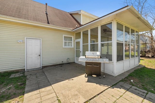 1571 Barrett Dr, Clarksville, TN 37043 - rear view of property featuring a sunroom, a shingled roof, and a patio area