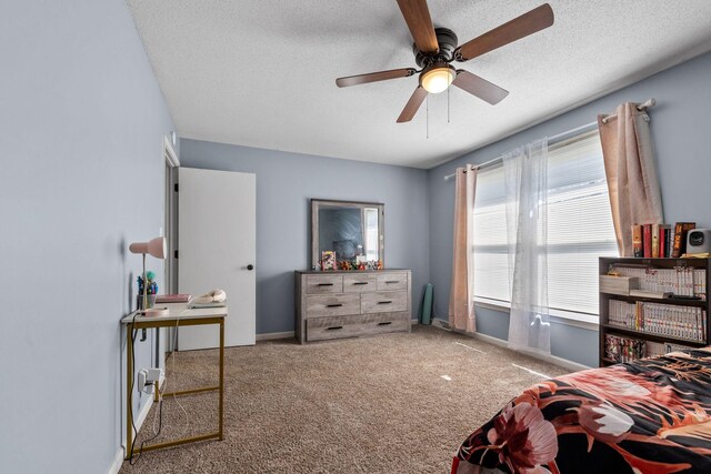 1571 Barrett Dr, Clarksville, TN 37043 - carpeted bedroom featuring baseboards, a textured ceiling, and ceiling fan