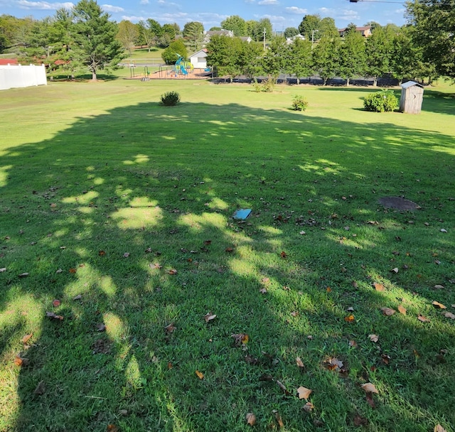 139 Hillcrest Cir, Gordonsville, TN 38563 - view of yard featuring an outbuilding and a storage unit