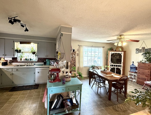 139 Hillcrest Cir, Gordonsville, TN 38563 - kitchen featuring a textured ceiling, light countertops, dishwasher, a ceiling fan, and a sink
