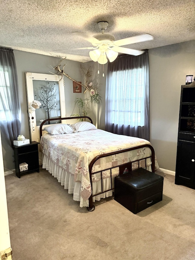 139 Hillcrest Cir, Gordonsville, TN 38563 - bedroom with baseboards, a textured ceiling, multiple windows, and carpet