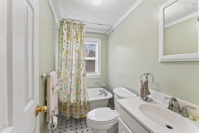 full bathroom featuring toilet, vanity, ornamental molding, and a textured ceiling