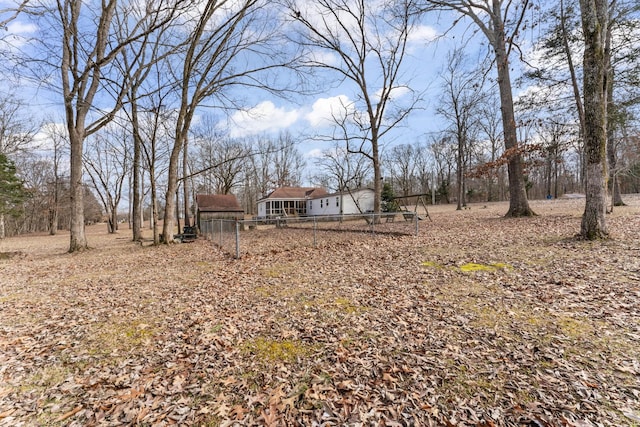 view of yard featuring fence