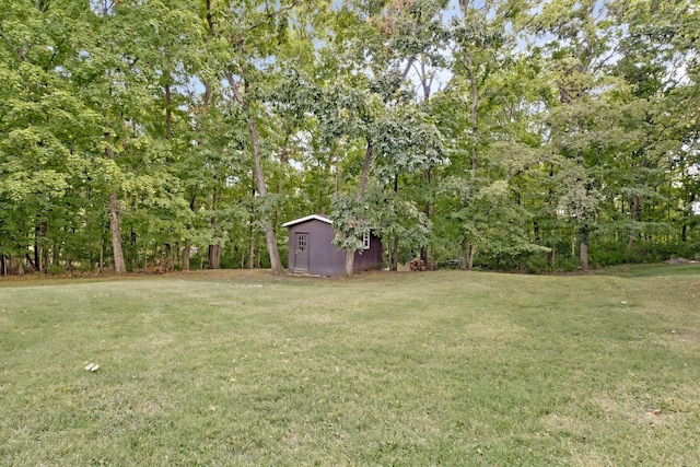 409 Cunniff Pkwy, Goodlettsville, TN 37072 - view of yard with a storage shed and an outdoor structure