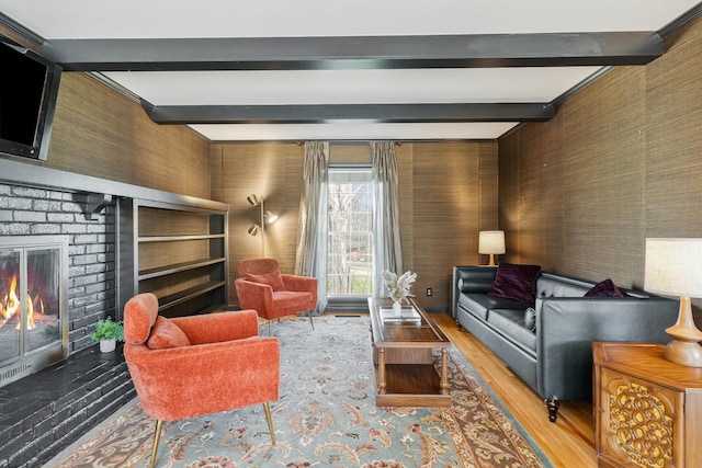 409 Cunniff Pkwy, Goodlettsville, TN 37072 - living area featuring a brick fireplace, beam ceiling, and wood finished floors