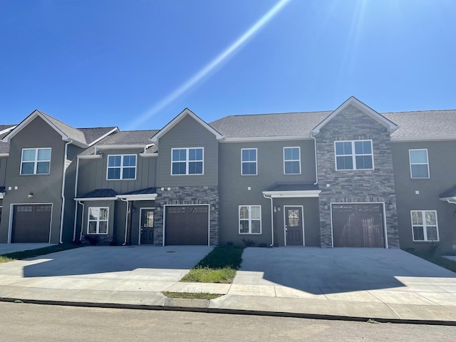 967 Horse Mountain Rd Unit 6D, Shelbyville, TN 37160 - view of front of home with stone siding, board and batten siding, driveway, and a garage