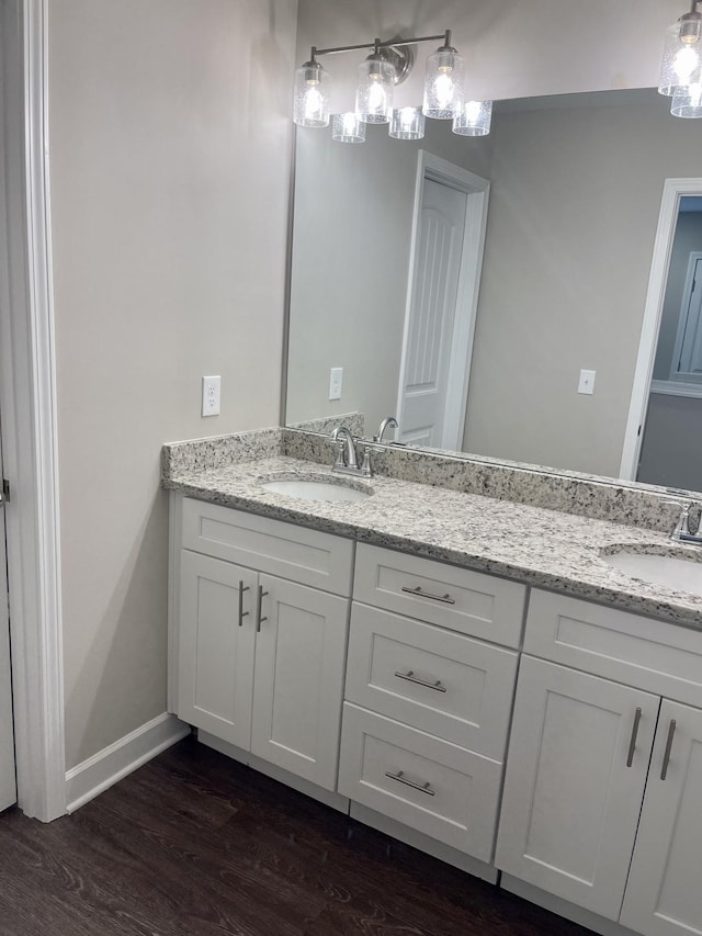 967 Horse Mountain Rd Unit 6D, Shelbyville, TN 37160 - full bathroom with double vanity, a sink, baseboards, and wood finished floors